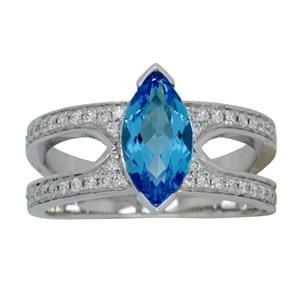 <p>Split Shank White Gold Marquise Topaz and Diamond Ring. Total Diamond Weight 0.36ct</p>